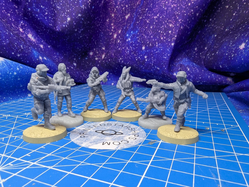 May include: Six miniature figurines of soldiers in combat poses. The figures are gray and stand on tan circular bases. They are set against a blue grid surface with a galaxy-themed backdrop. The figures are holding weapons, and some are in motion.